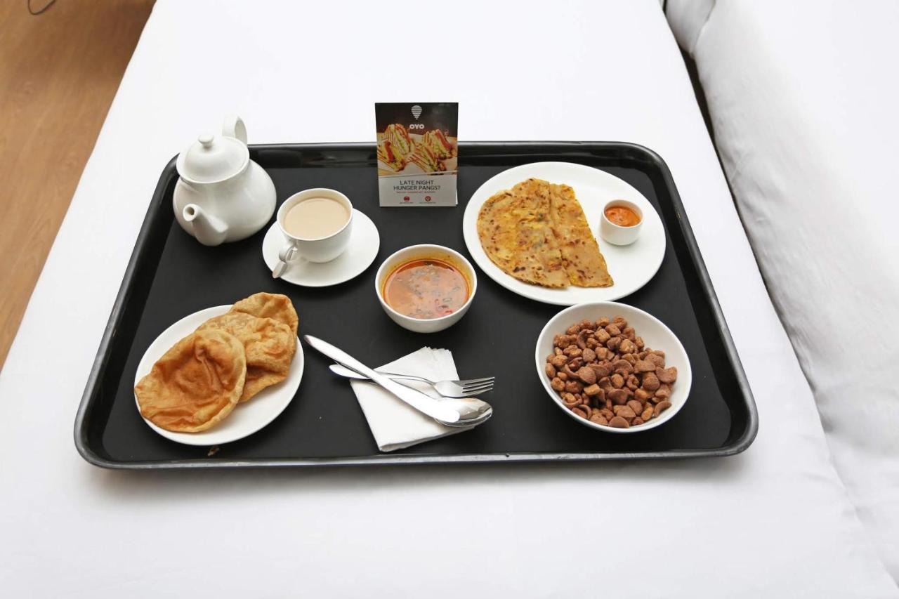 Oyo 28303 Yesh Comforts Hotel Madikeri Luaran gambar